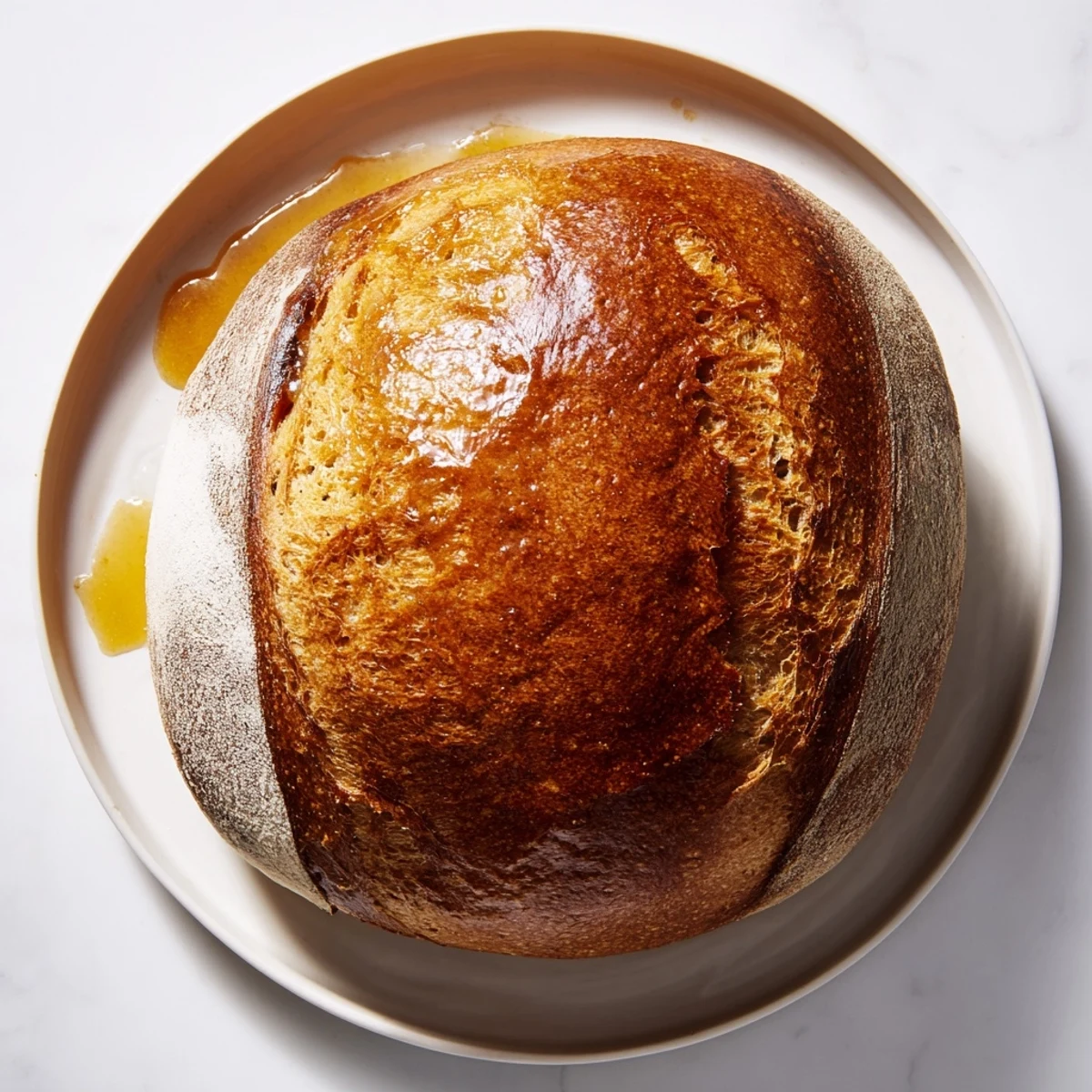 Freshly baked Quick Skillet Cornbread, easily imagined, smells amazing, brushed with melted honey butter, ready to be served.