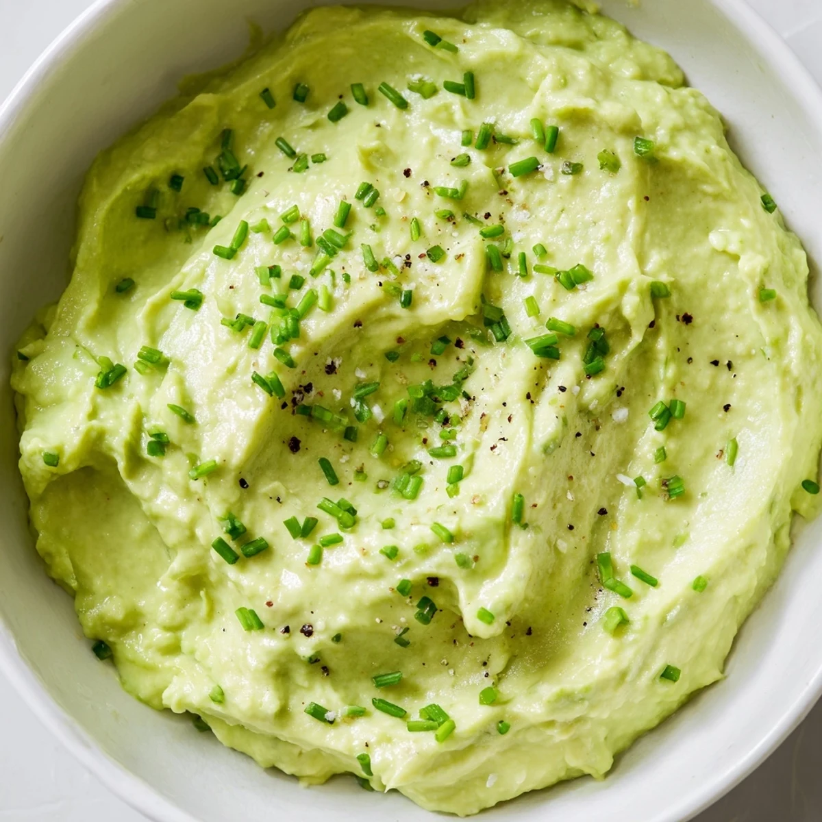 Smooth and flavorful, this Avocado Cottage Cheese Dip is perfect for dipping, or as a spread.